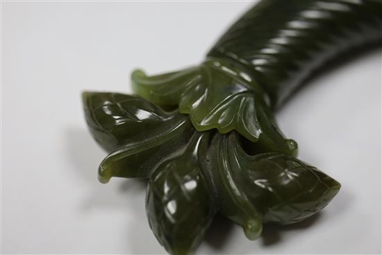 A Mughal spinach jade dagger handle, 5.75in.